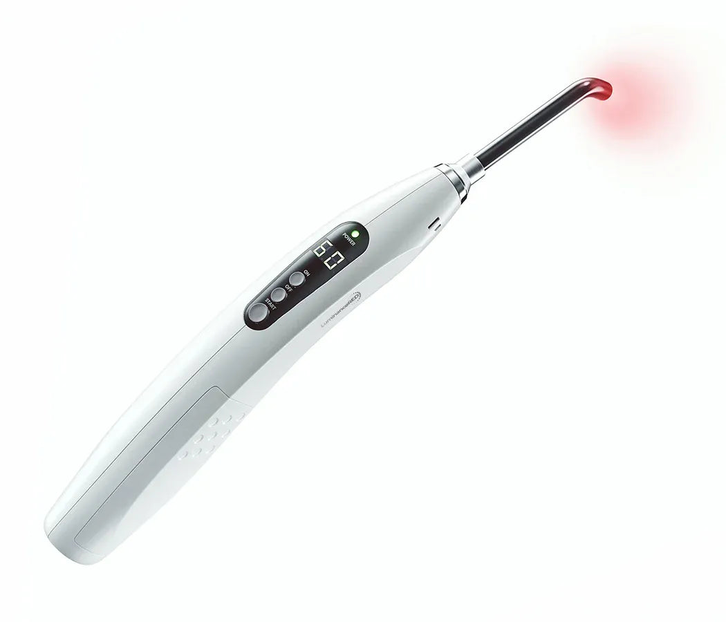 Luminance RED device showing digital timer display and red light therapy in action